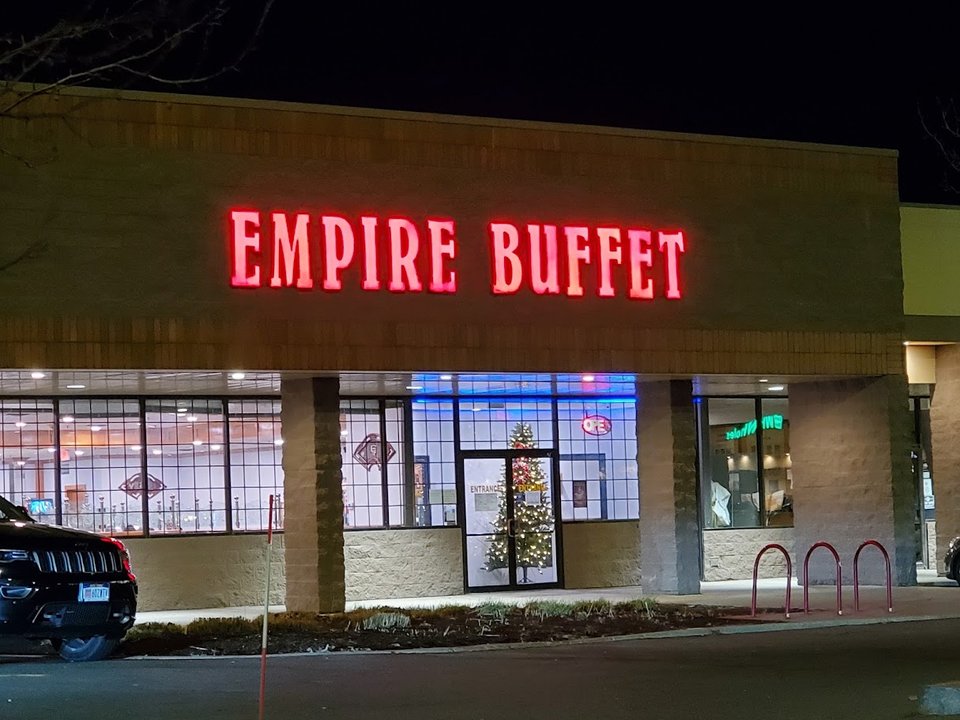 Wide buffet spread with classic Chinese dishes.